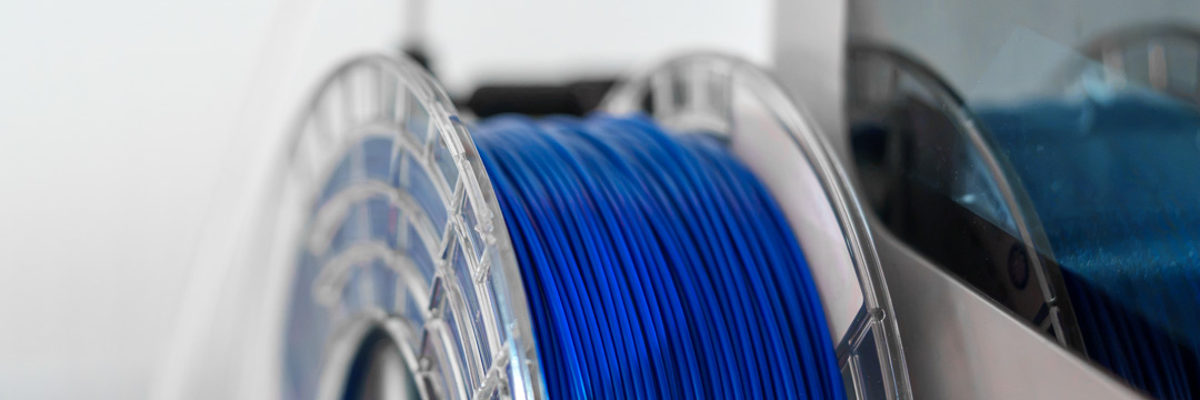 Gelbe KIT3D Filamentrolle als Emotionsbild für PETG FDM 3D-Druck